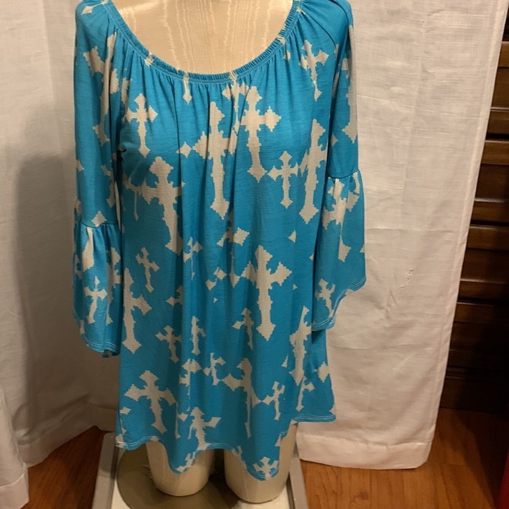 Size large unique scoop neck top/tunic. Can possibly be worn off shoulders